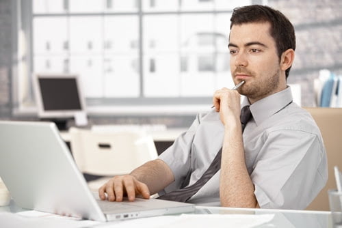 Engaged businessman learning about new marketing strategies he can adopt to his current marketing