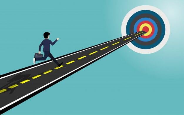 Fun, animated picture of a businessman running with a briefcase on a road straight toward the bullseye of a target