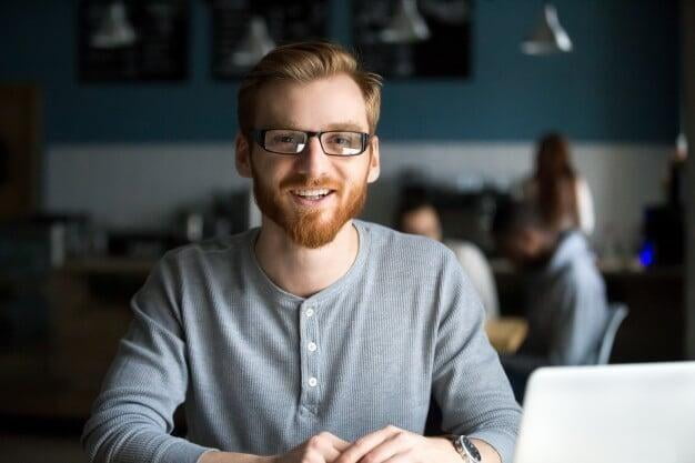 Excited male business owner ready to start online course 